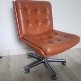 Vintage armchair in brown leather
