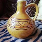 Glazed ocher round pitcher with handle