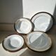 8 Limoges plates