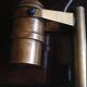 Lampe bateau bronze sur socle bois