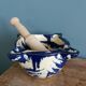 Glazed terracotta mortar and wooden pestle