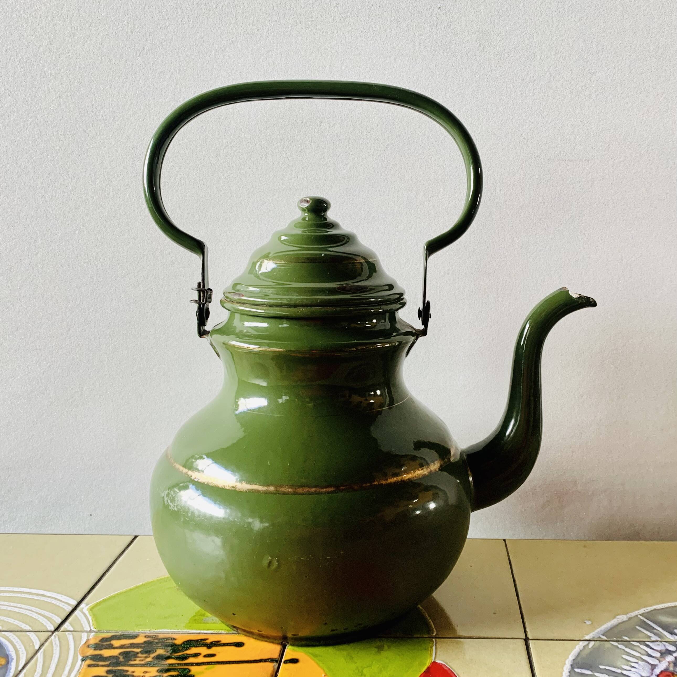 Vintage green enameled sheet metal kettle