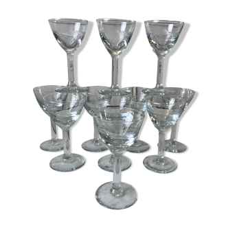 Set of 11 molded glass wine glasses engraved 20s