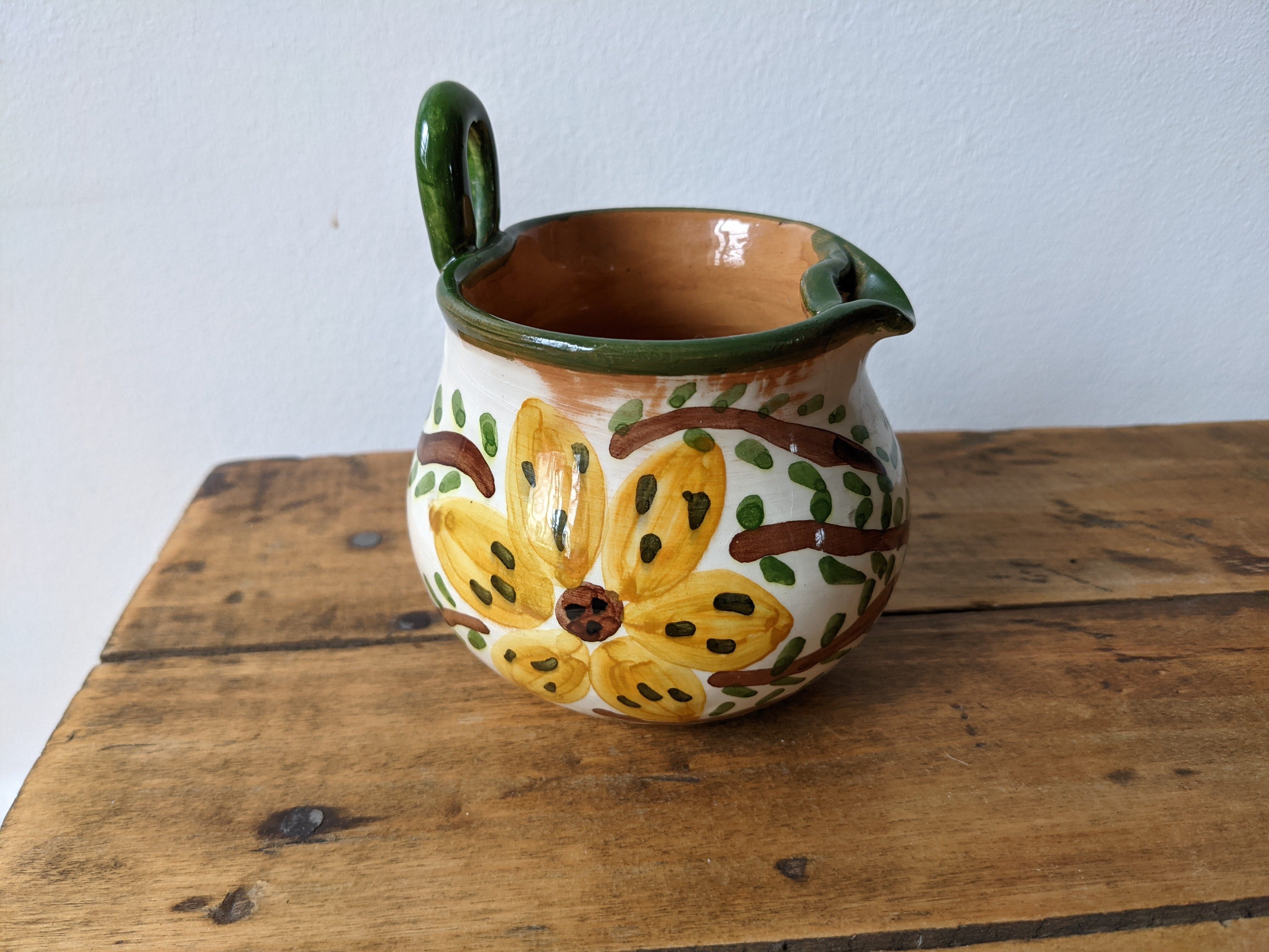 Yellow and green flowery milk pot
