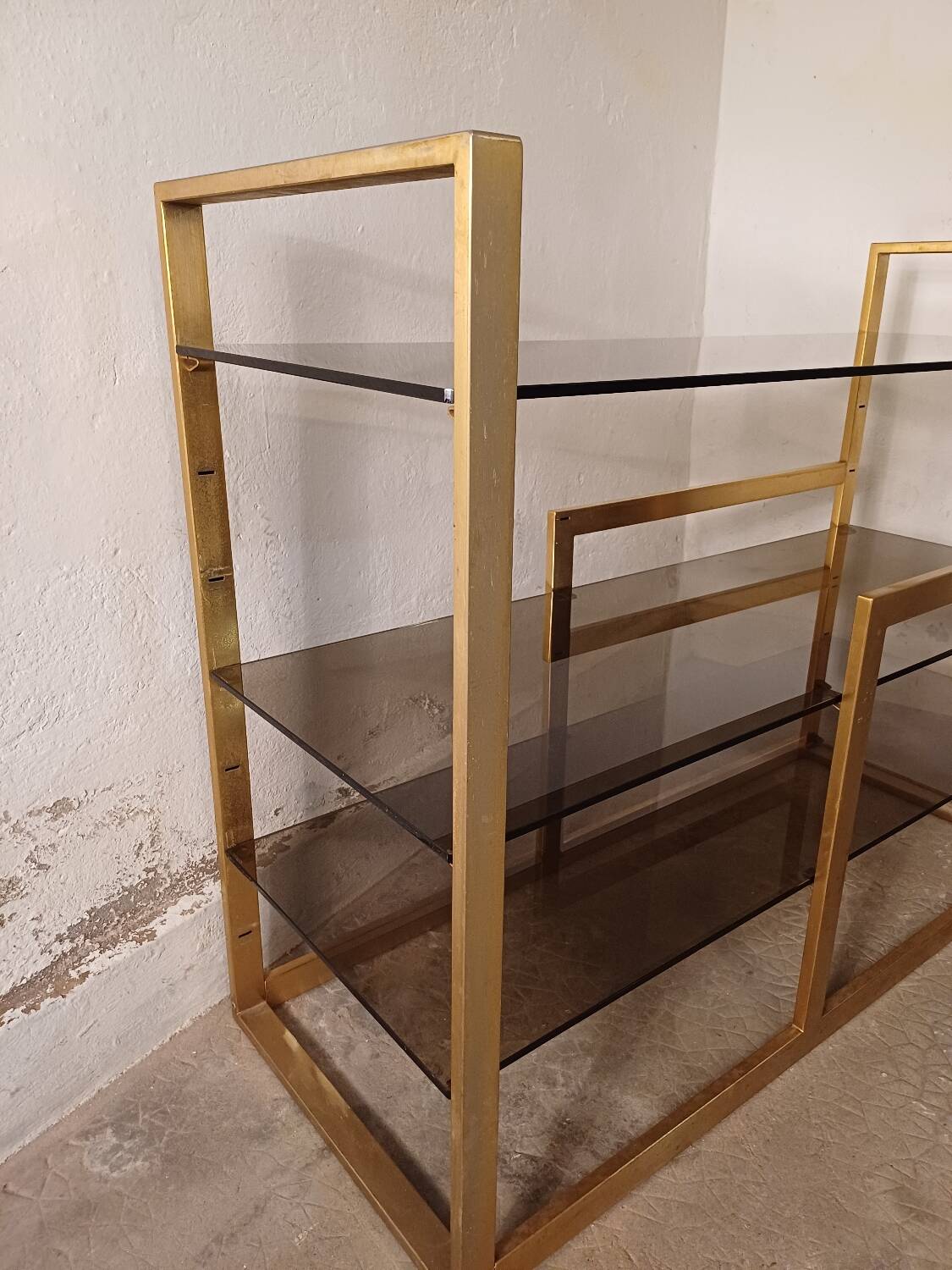 Brass shelf, smoked glass