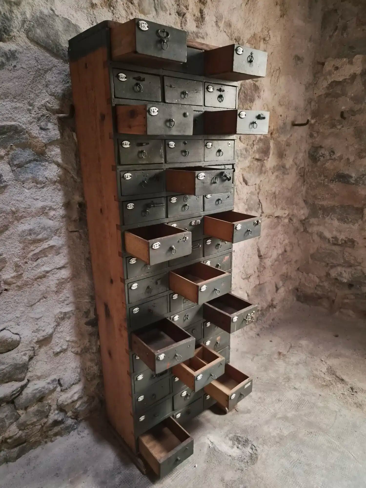 Antique hardware cabinet with 48 drawers, circa 1900.