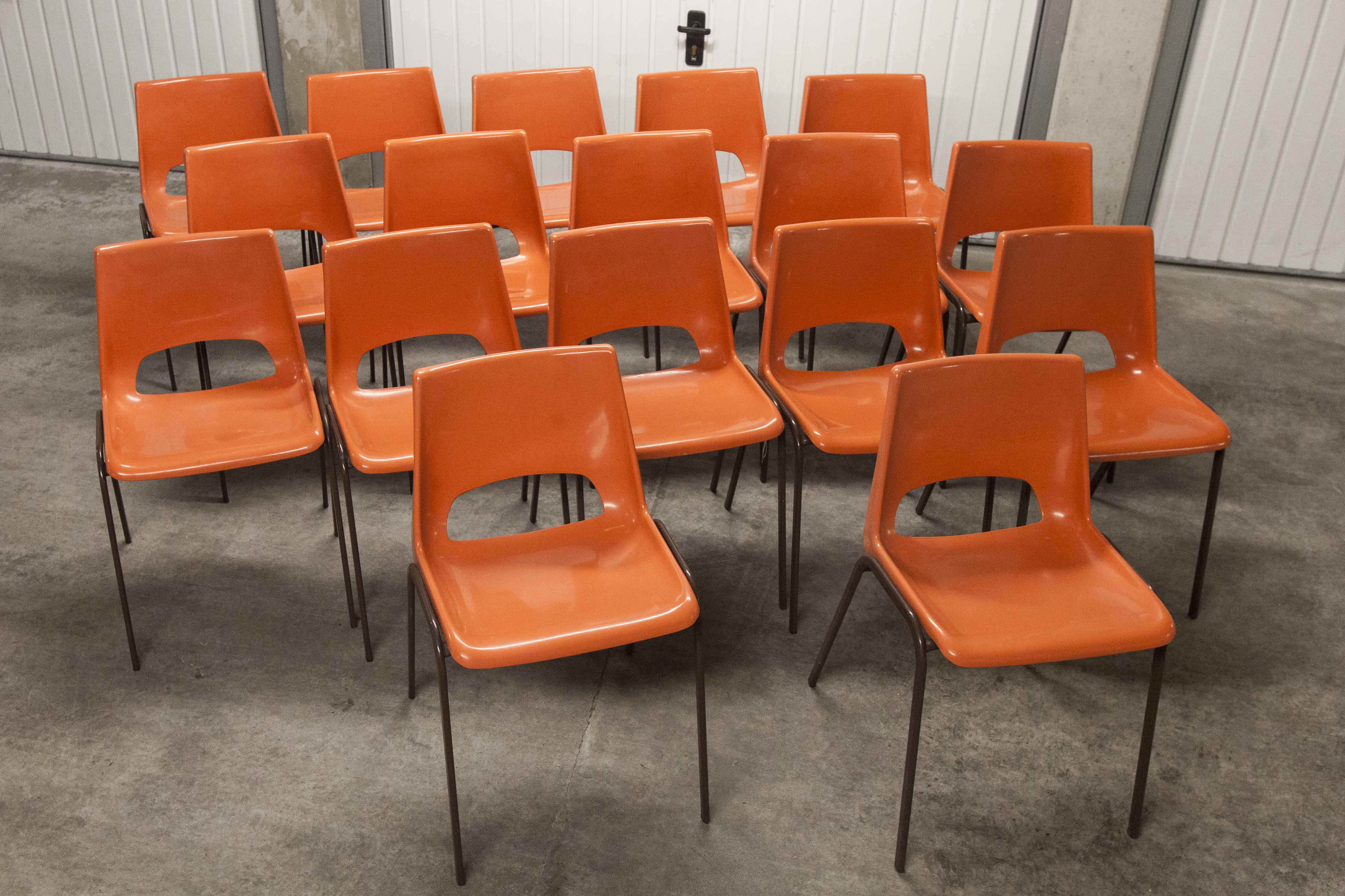 Set of 17 vintage orange chairs 1970