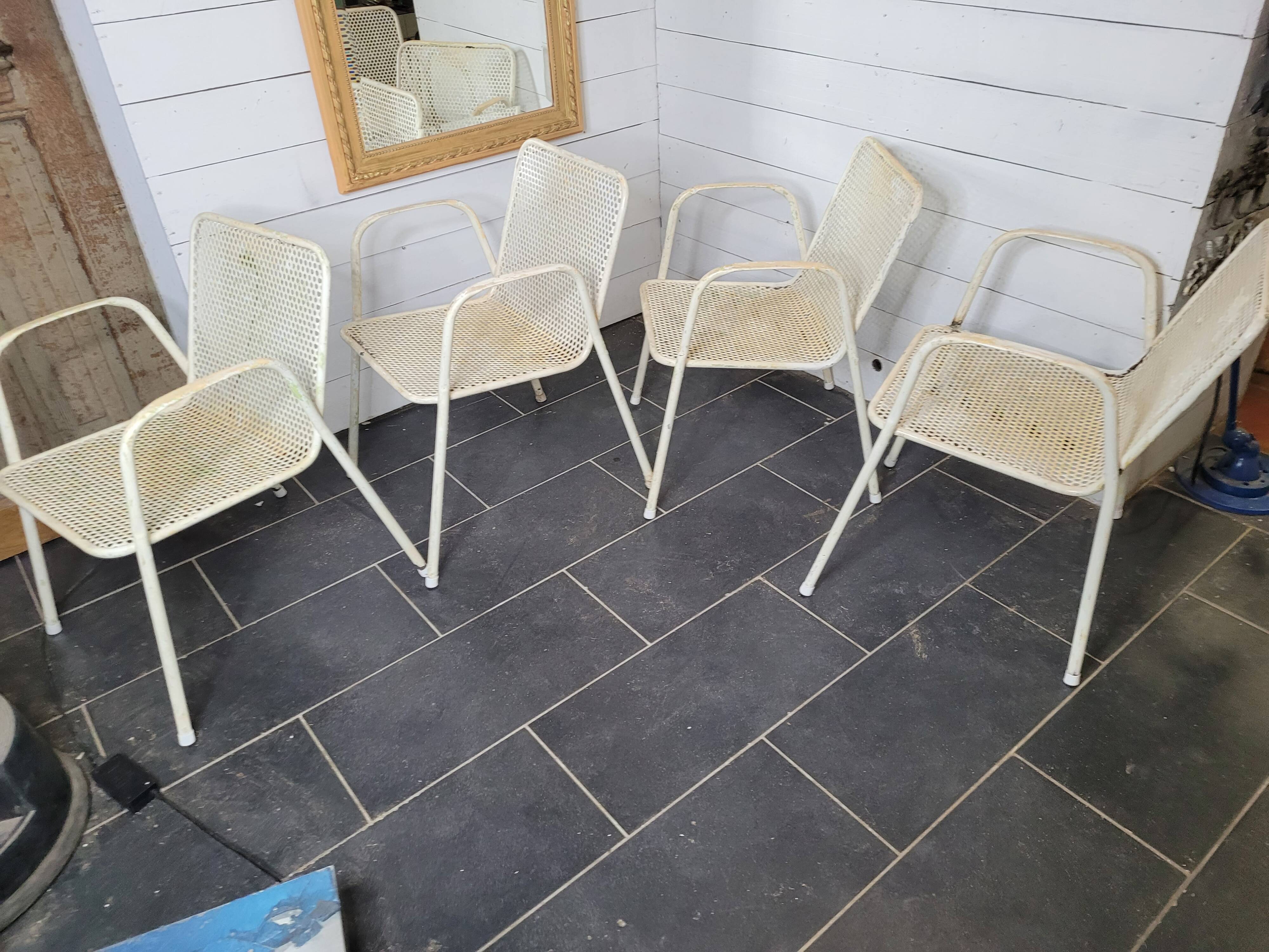 4 perforated metal garden armchairs