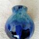 petit vase boule en céramique bleu turquoise