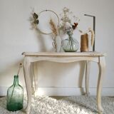 Old patinated coffee table and curved feet