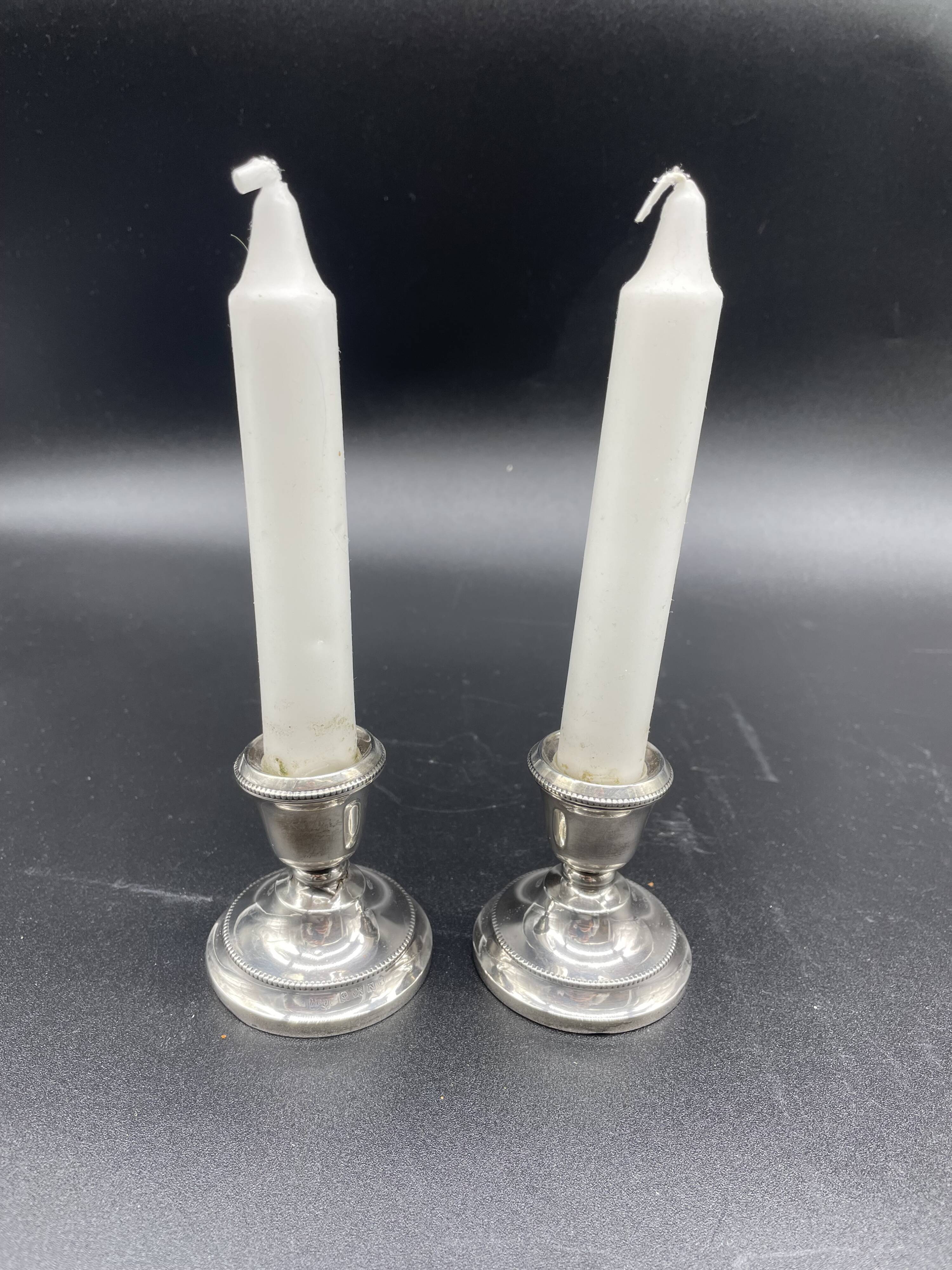 Pair of antique sterling silver candlesticks - English silversmith - 1934