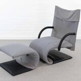 Zen easy chair with footrest by claude brisson for ligne roset