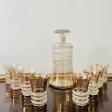 Carafe liqueur service with 8 gilded crystal glasses from the 1930s