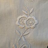 Hand-embroidered oval placemat