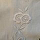 Hand-embroidered oval placemat