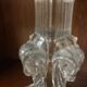 pair of cut glass candlesticks with lion and ram head decor, late 19th century