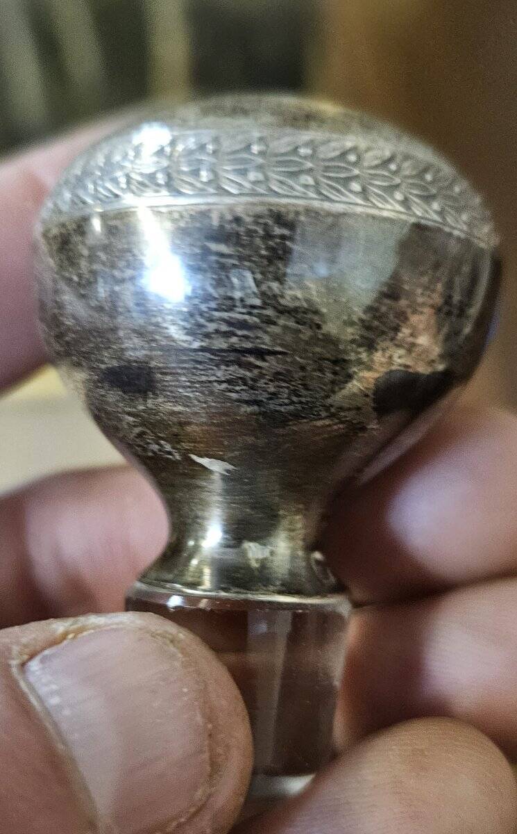 Pair of antique crystal and solid silver decanters.