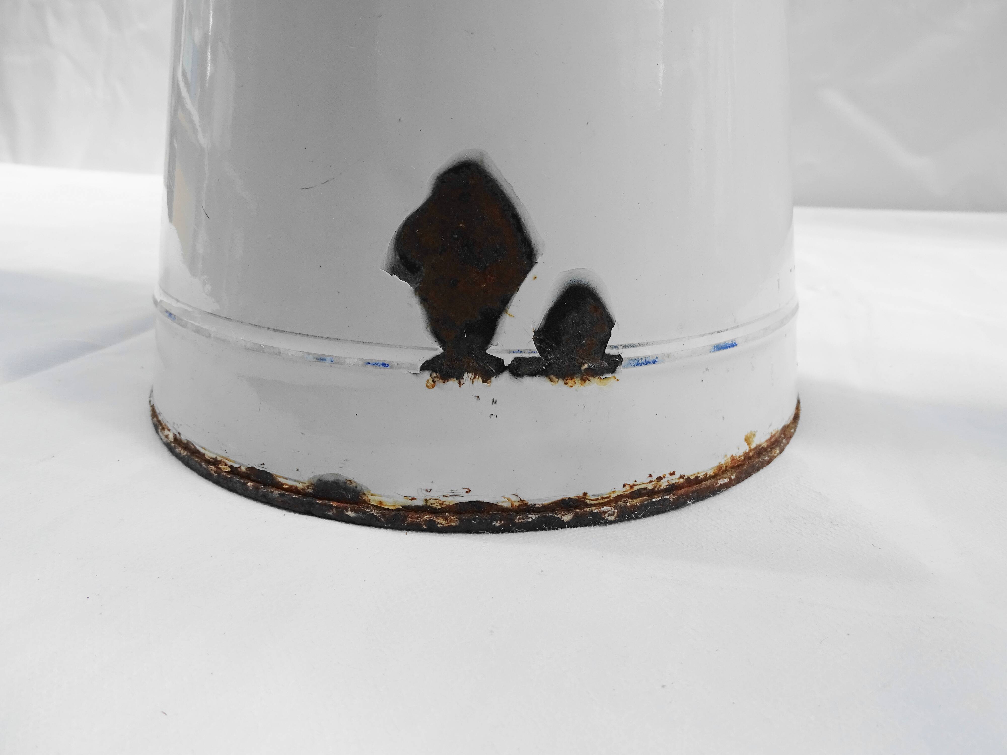 White enamelled iron broc