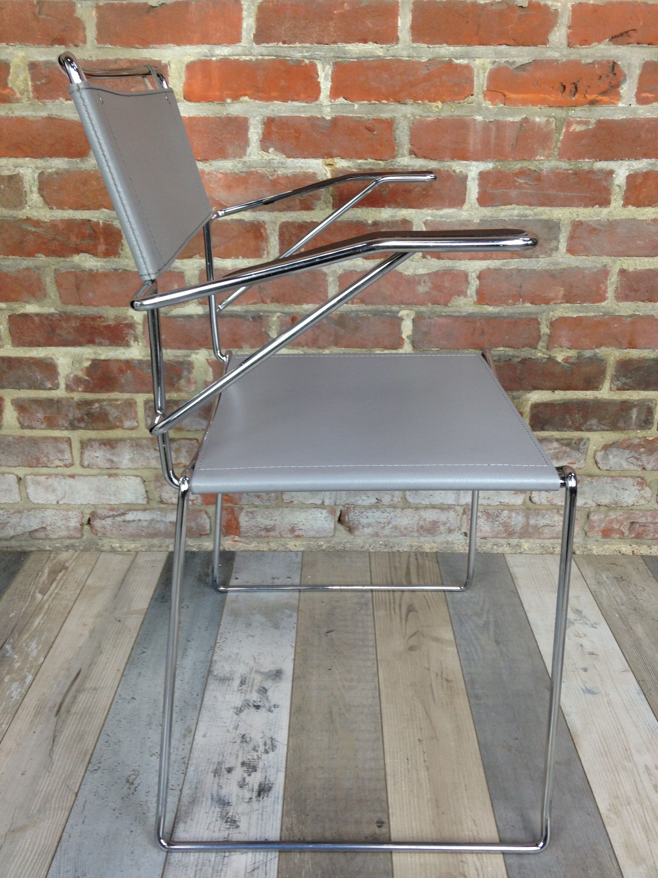 Lot of 4 Italian design chairs in leather and chrome