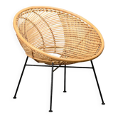 Round rattan lounge chair with black metal frame