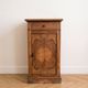 Antique bedside table in waxed wood