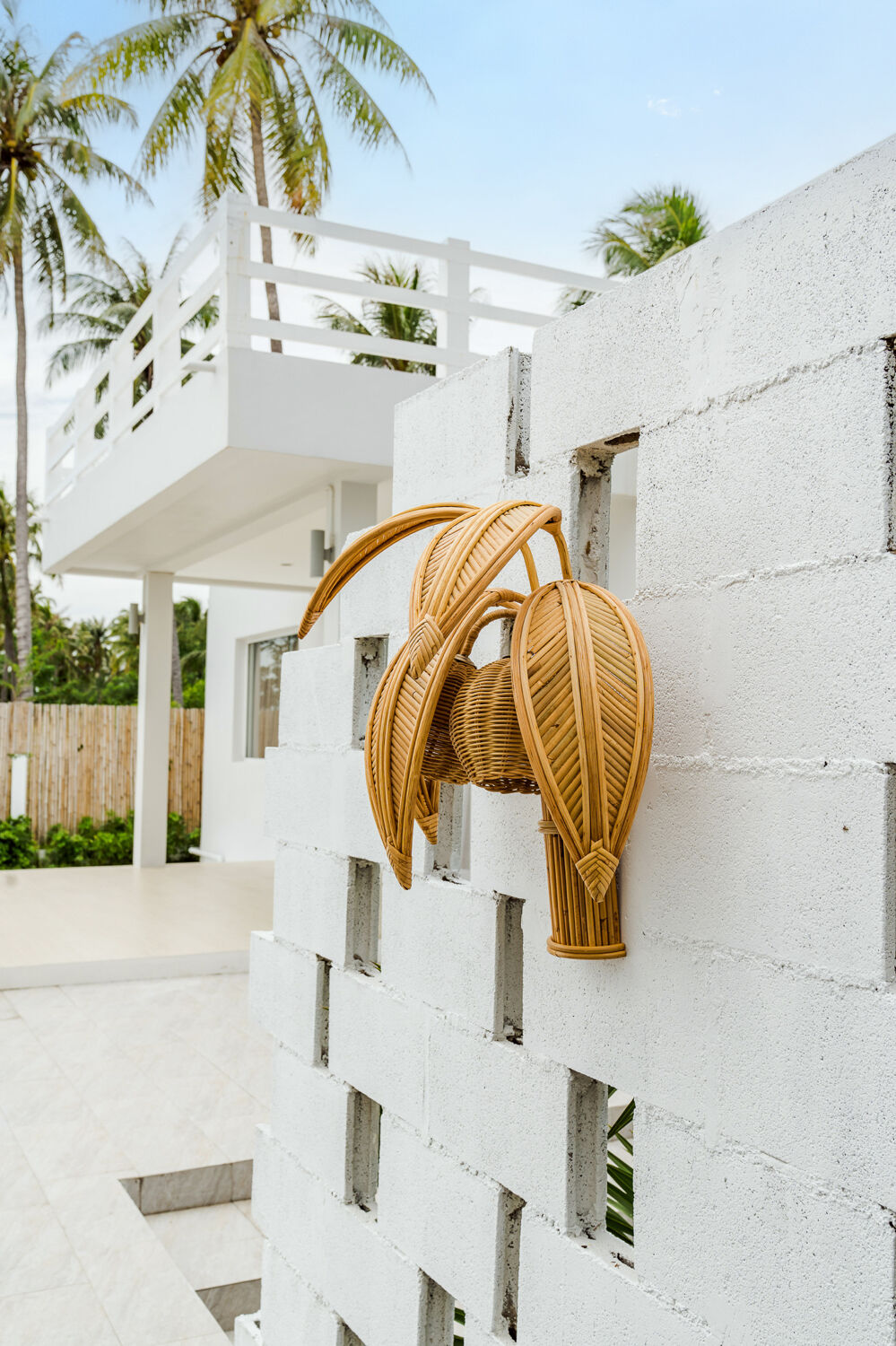 Pair of "coconut/palm" wall lights in rattan