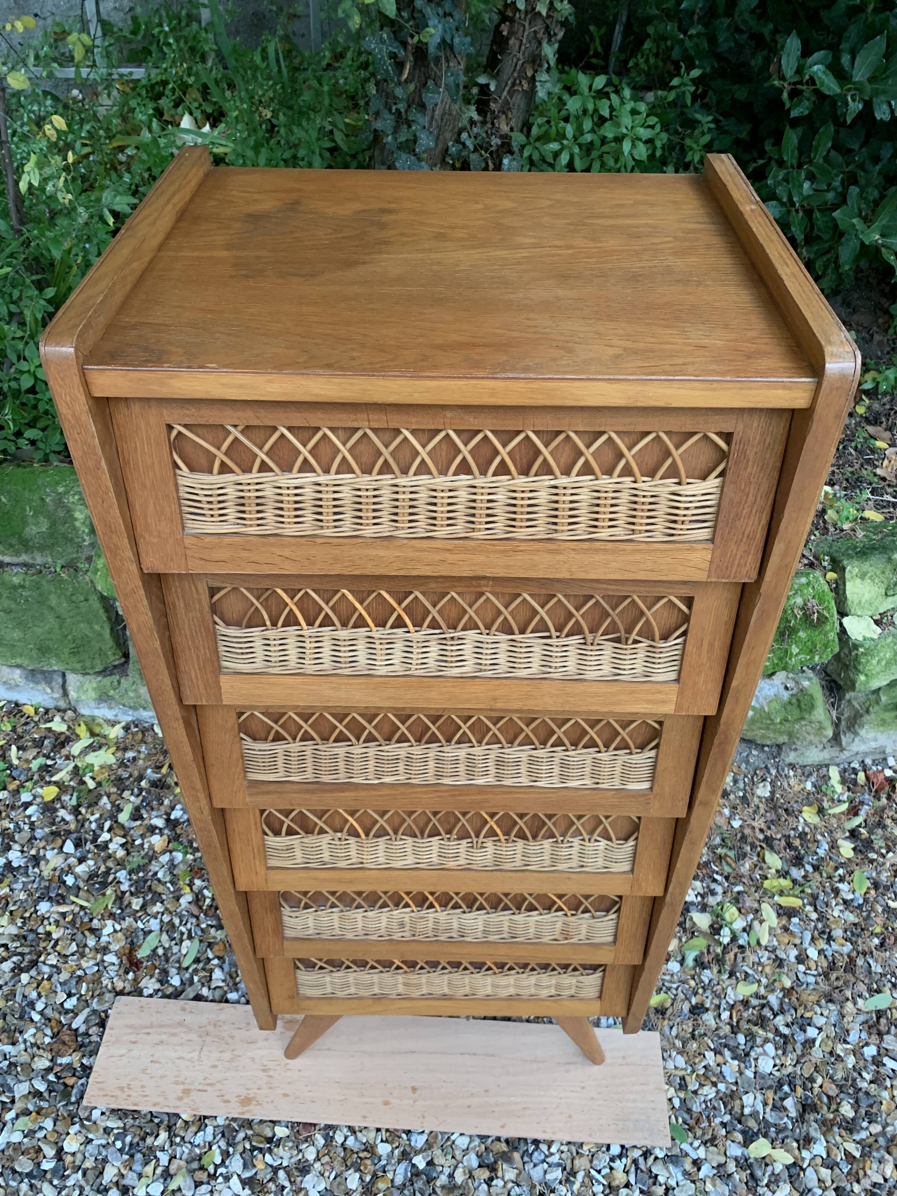 Vintage rattan chiffonier with compass feet 1950