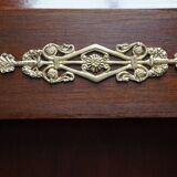 Empire style mahogany display bookcase with gilt bronze decoration and three doors.