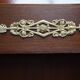 Empire style mahogany display bookcase with gilt bronze decoration and three doors.