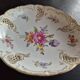 Small bowl / pierced plate in painted Nymphenburg porcelain.