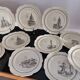 Series of 12 dessert plates and its cake tray Gien Paris Monuments