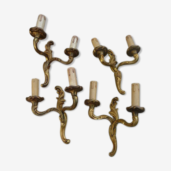 Two pairs of bronze wall lamps