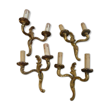 Two pairs of bronze wall lamps