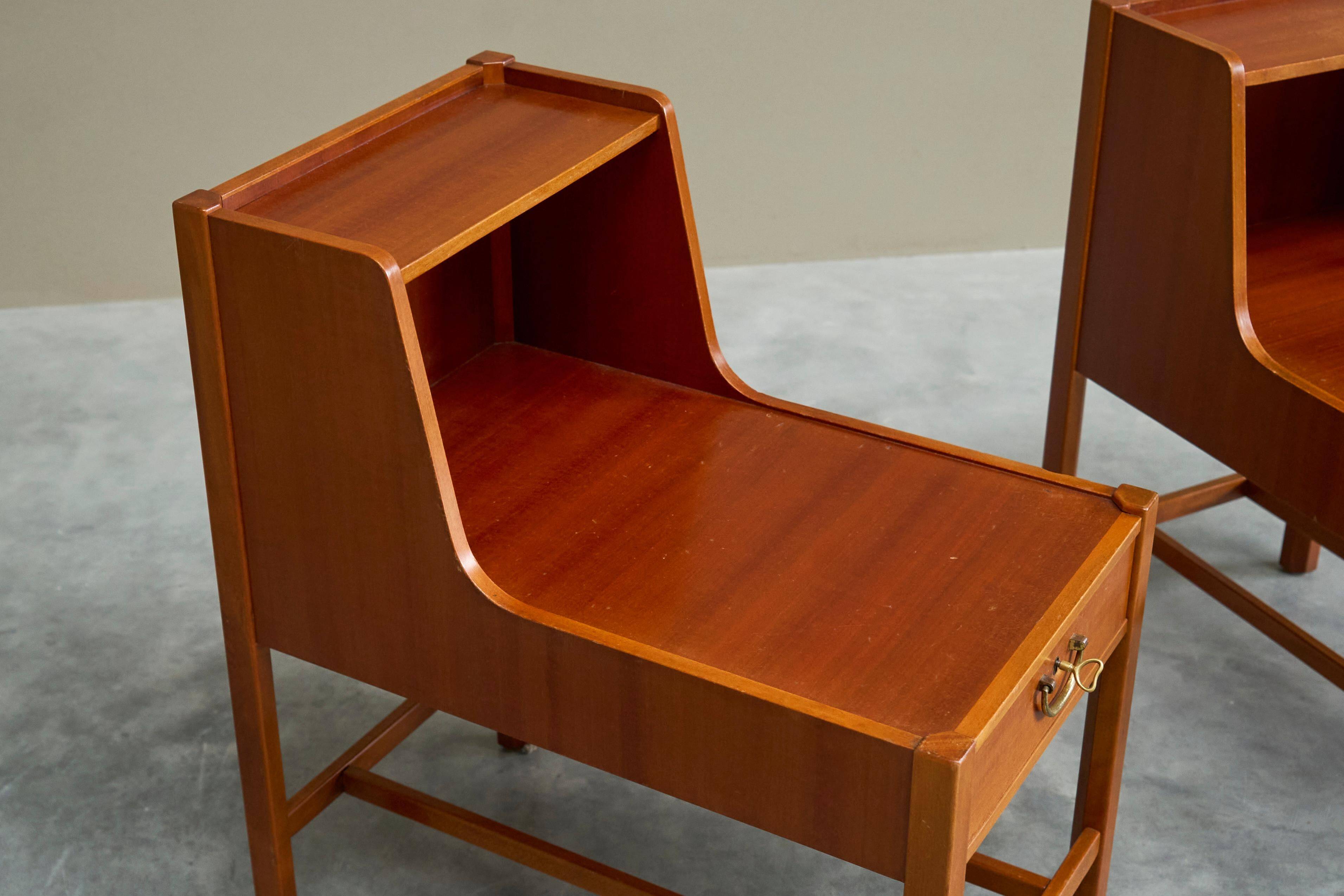 Pair of bedside tables by Nordiska Kompaniet in teak, 1952, by David Rosén.