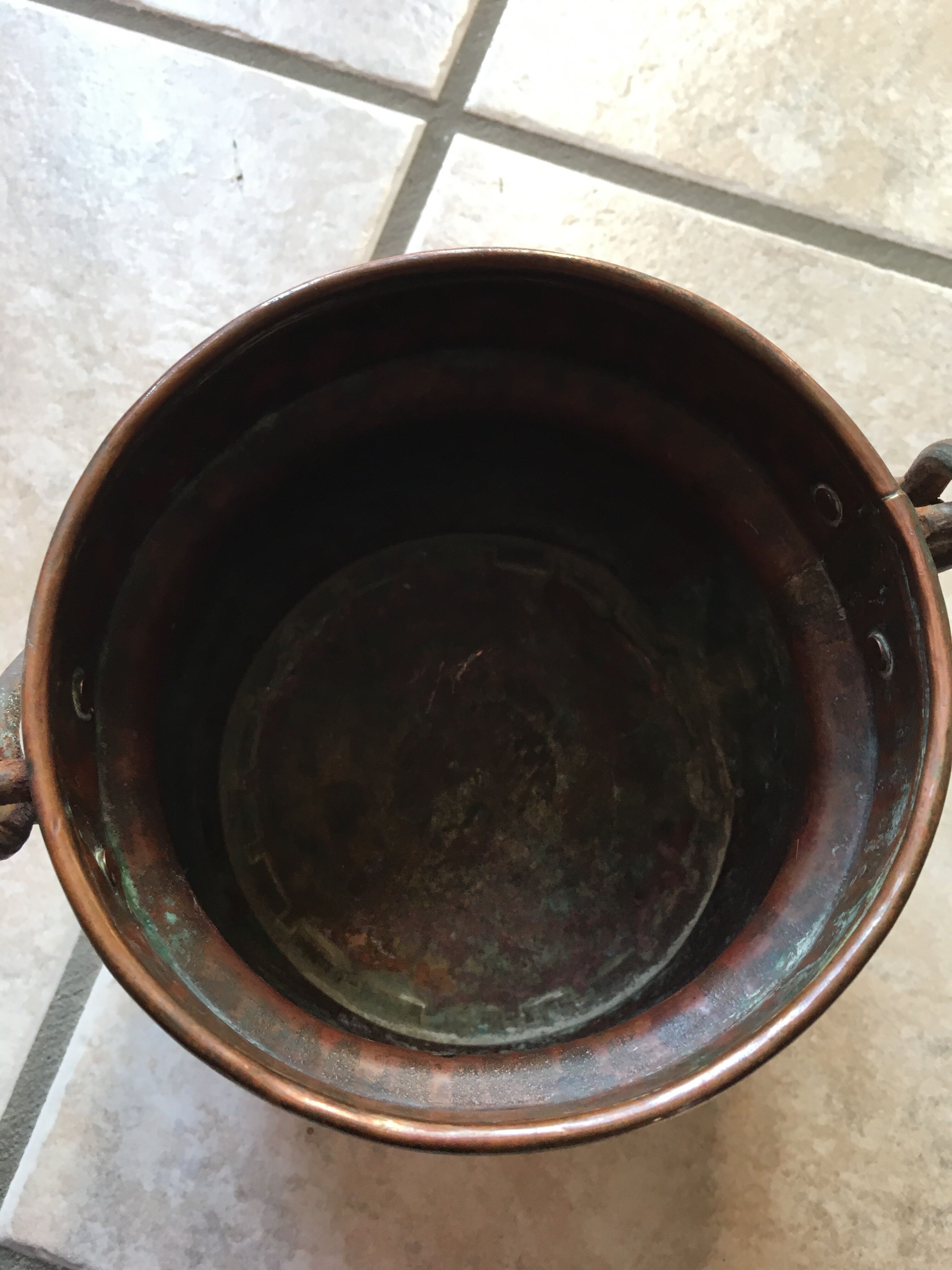 Old copper pot cover with cove