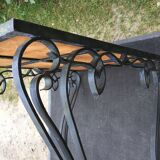 Vintage ceramic coffee table by Guy Trévoux with wrought iron base.