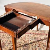 Empire-style demi-lune console from the 19th century.