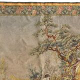 Wall tapestry featuring a pastoral scene.