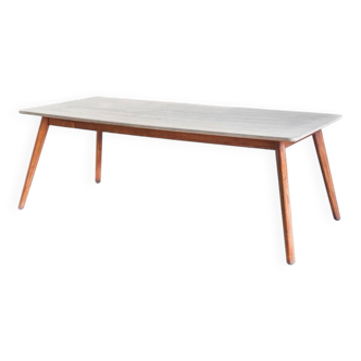 Scandinavian style dining table. Polished and varnished wood and concrete. For indoor or outdoor use.