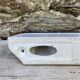 Antique wall shelf for bathroom in white porcelain.