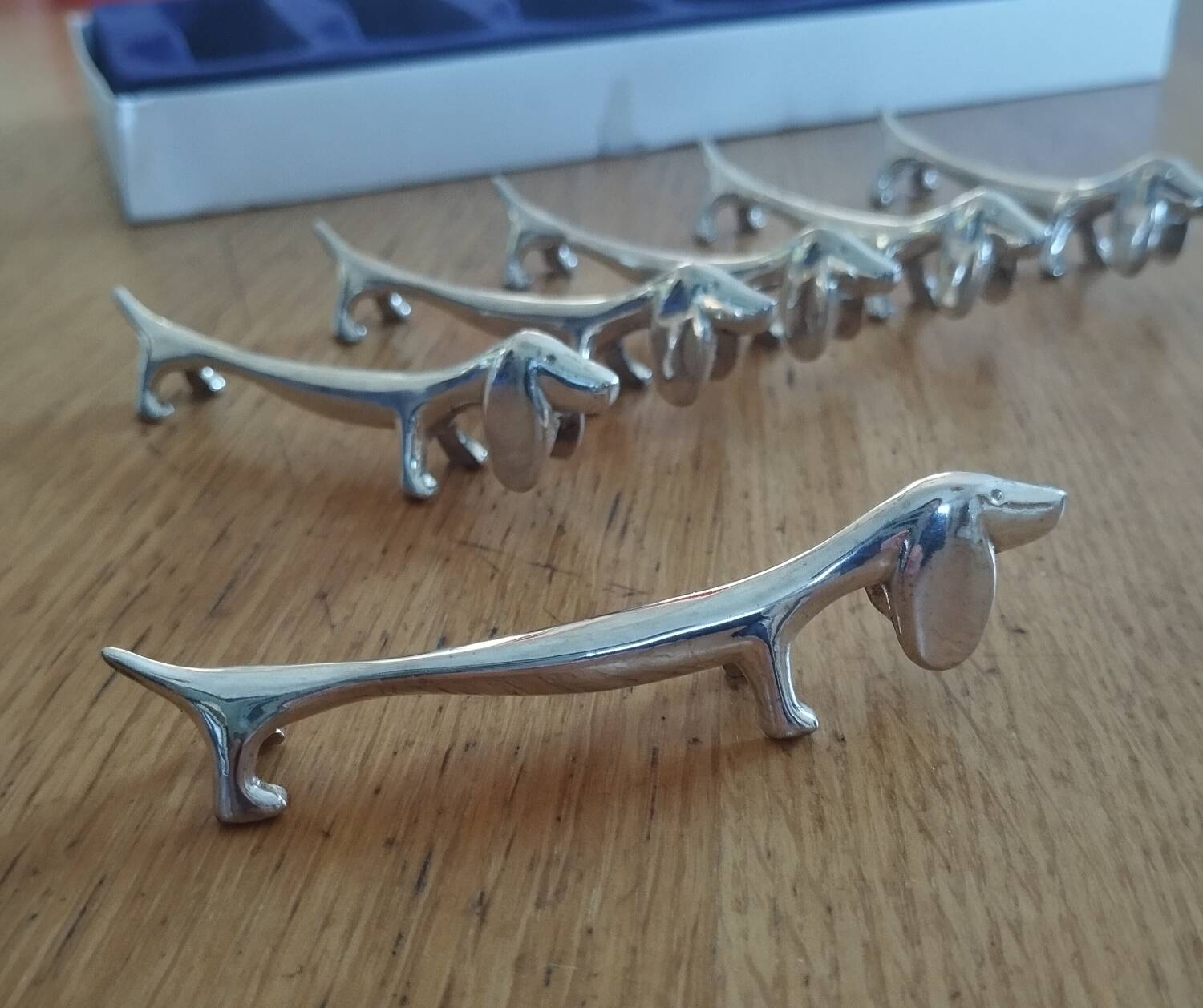 Silver metal dog knife holder