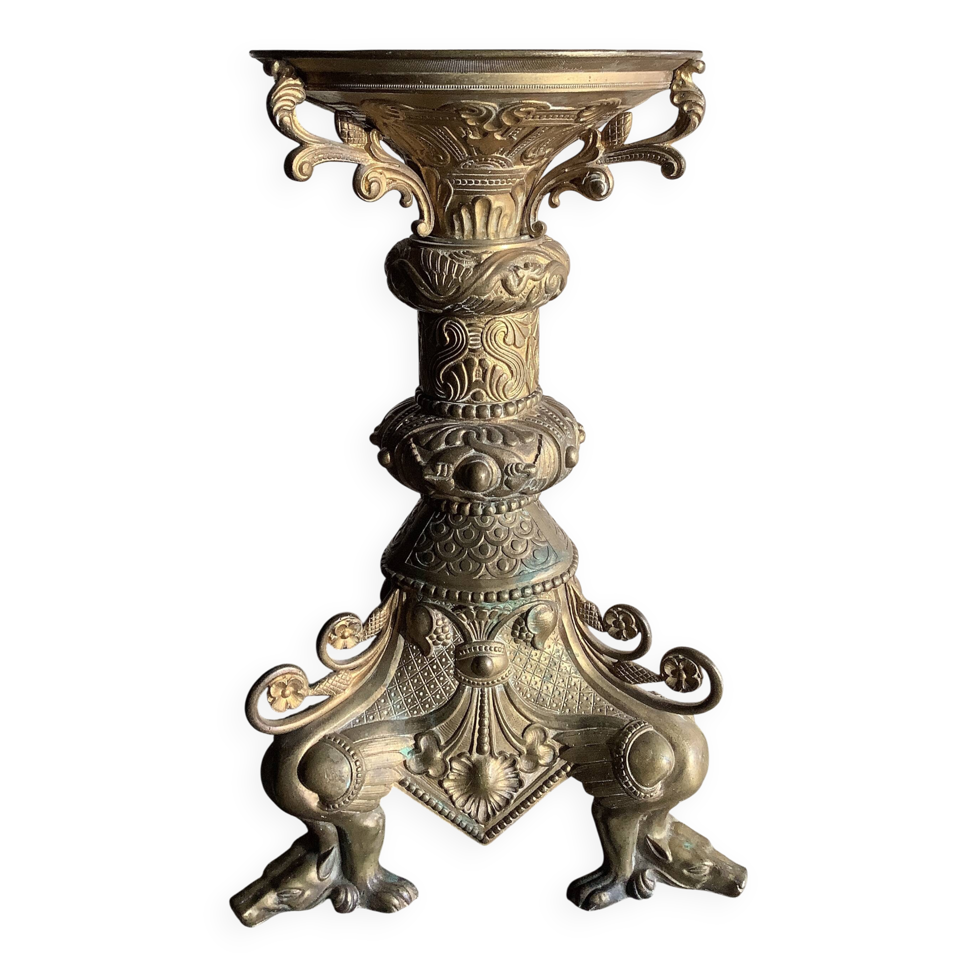 Large bronze candlestick with tripod and winged dog decoration, 19th century.