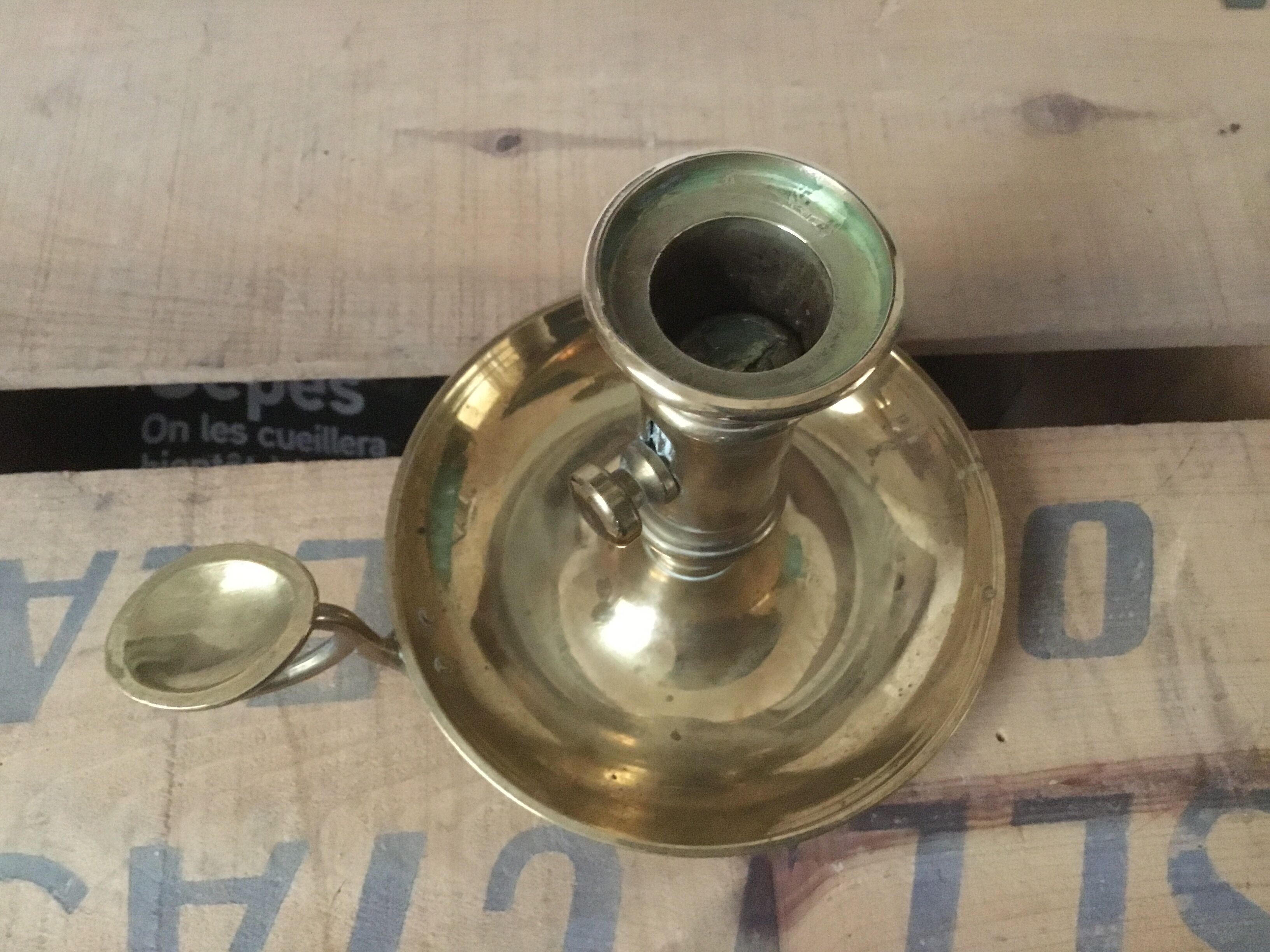 Thumb brass candlestick
