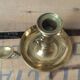 Thumb brass candlestick
