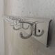 Wall-mounted aluminium coat rack of 225 cm with 16 double hooks, 1960s.