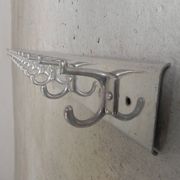Wall-mounted aluminium coat rack of 225 cm with 16 double hooks, 1960s.