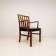 Mid-century armchair by Ole Wanscher for Fritz Hansen, stained beech and leather.