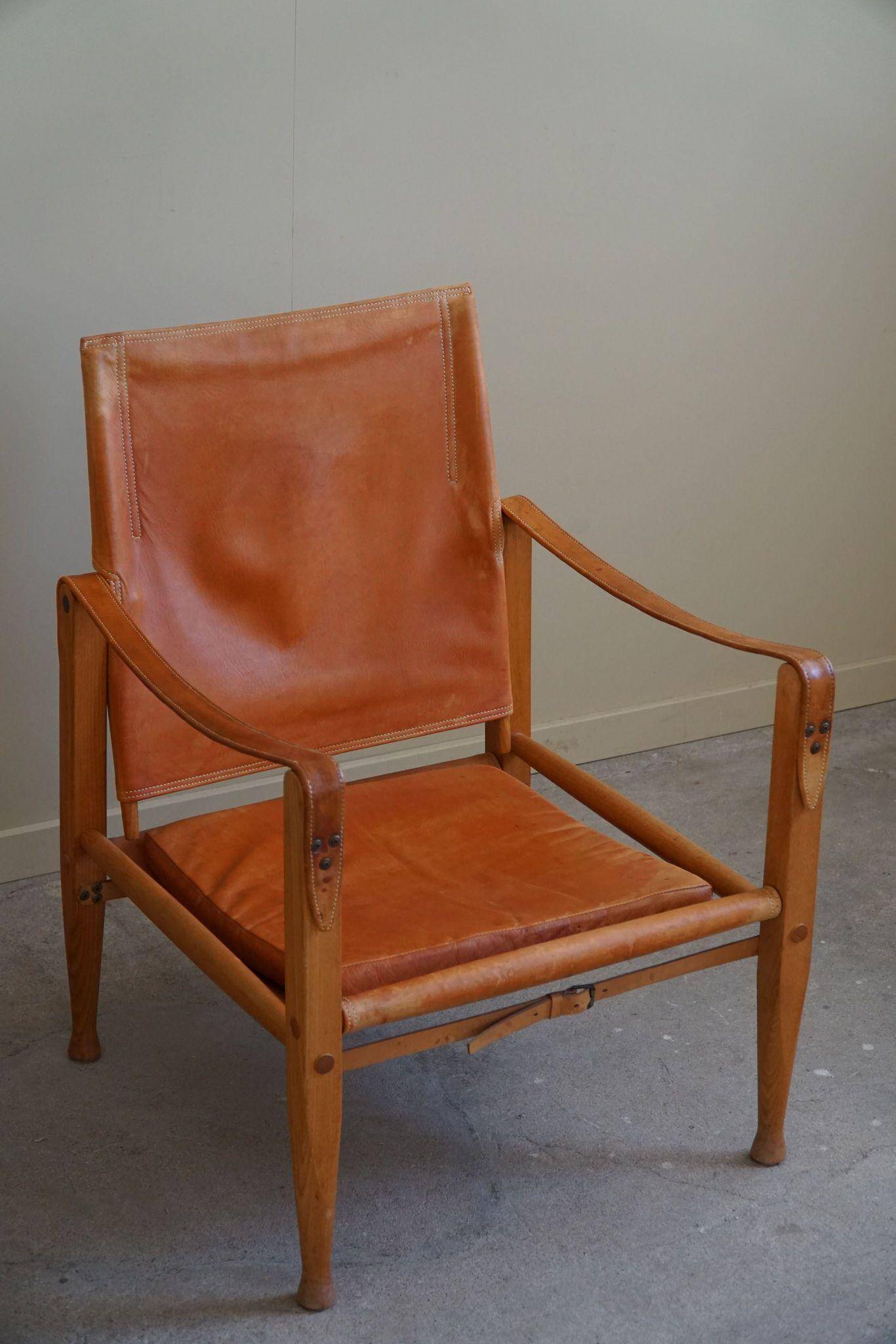 Kaare Klint, a pair of Safari chairs in ash and leather, Rud. Rasmussen, 1960s.