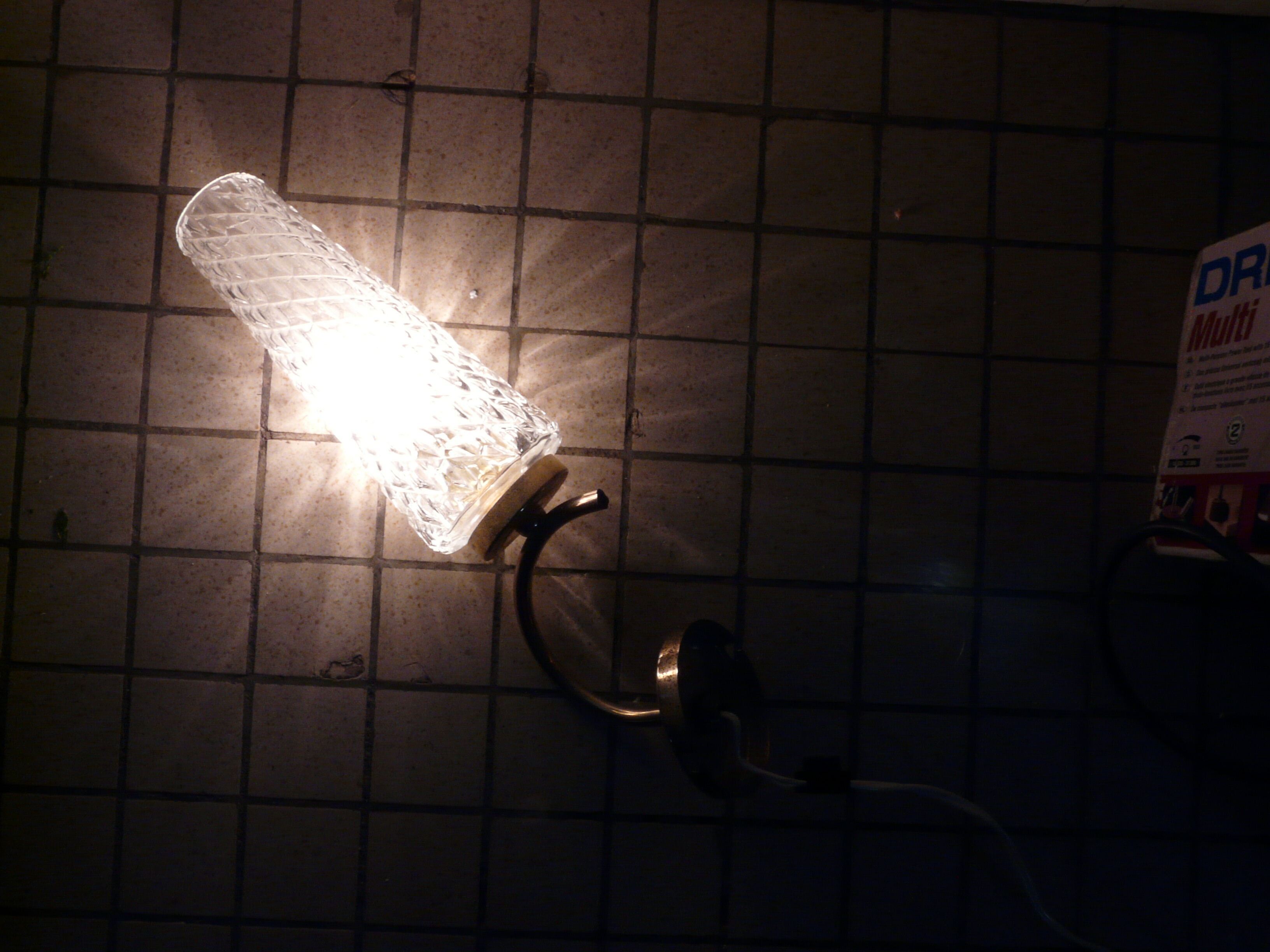 Metal and glass sconce from the 1950s