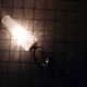 Metal and glass sconce from the 1950s